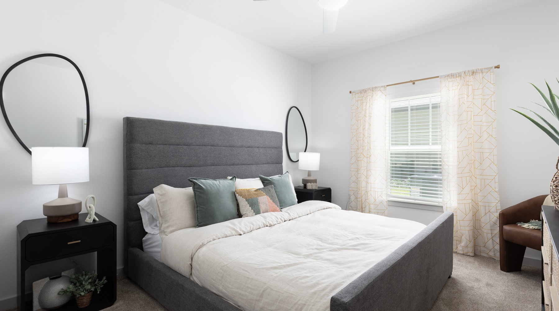 Spacious bedroom with natural light at Madison Waterstar apartments for rent in Kissimmee FL 34747.